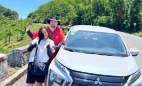 Scenic one-day road trip from Hue to Hoi An featuring mountain passes, coastal landscapes, Lap An Lagoon, Lang Co Beach, and the historic streets of Hoi An Ancient Town.