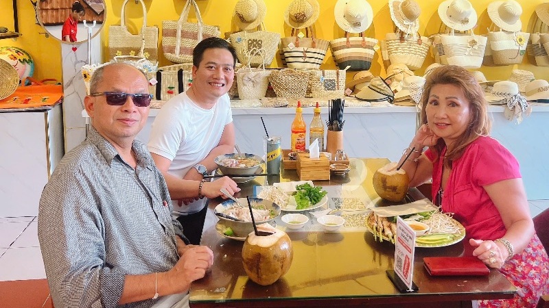 Travelers exploring Hue, Vietnam, visiting the Imperial City, royal tombs, and the Perfume River during a multi-day trip.